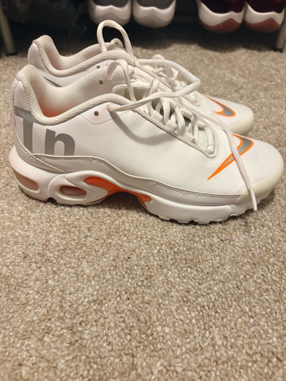 Nike White Low-Top Sneakers with Orange Accents